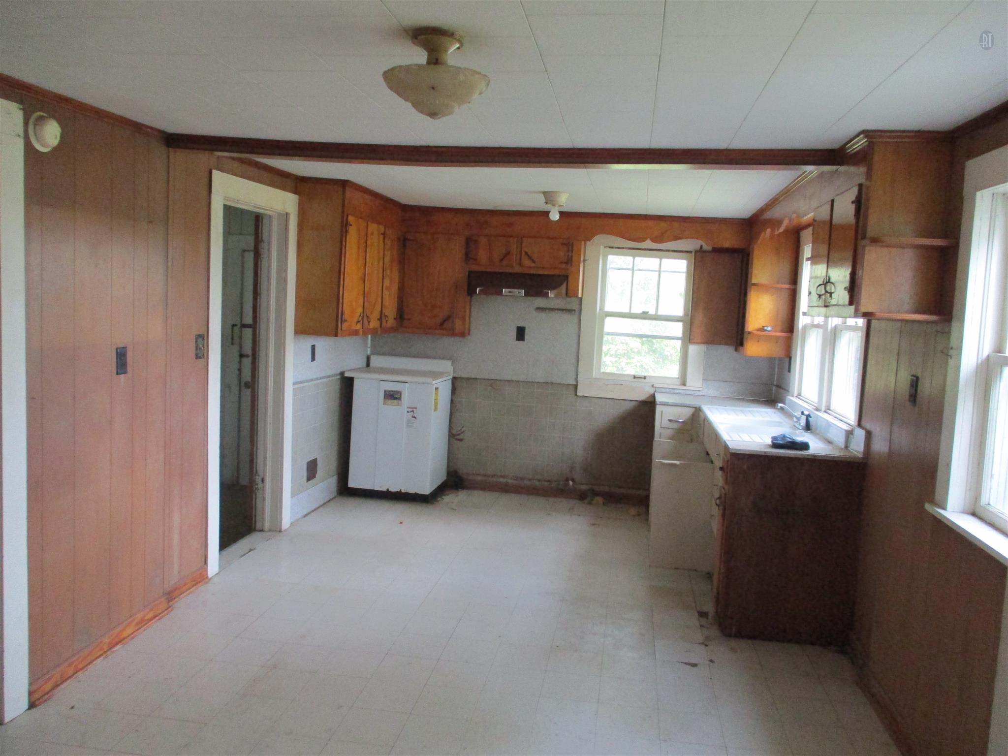 29 Owens Road Five Points, TN 38457 - Photo 15 of 26 a kitchen with cabinets and wooden floor