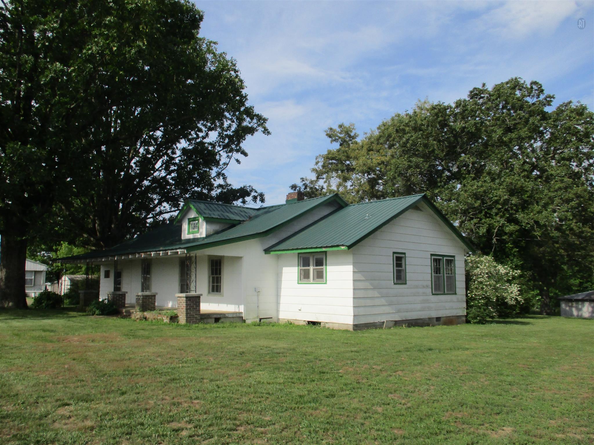 29 Owens Road Five Points, TN 38457 - Photo 5 of 26 a front view of a house with a garden