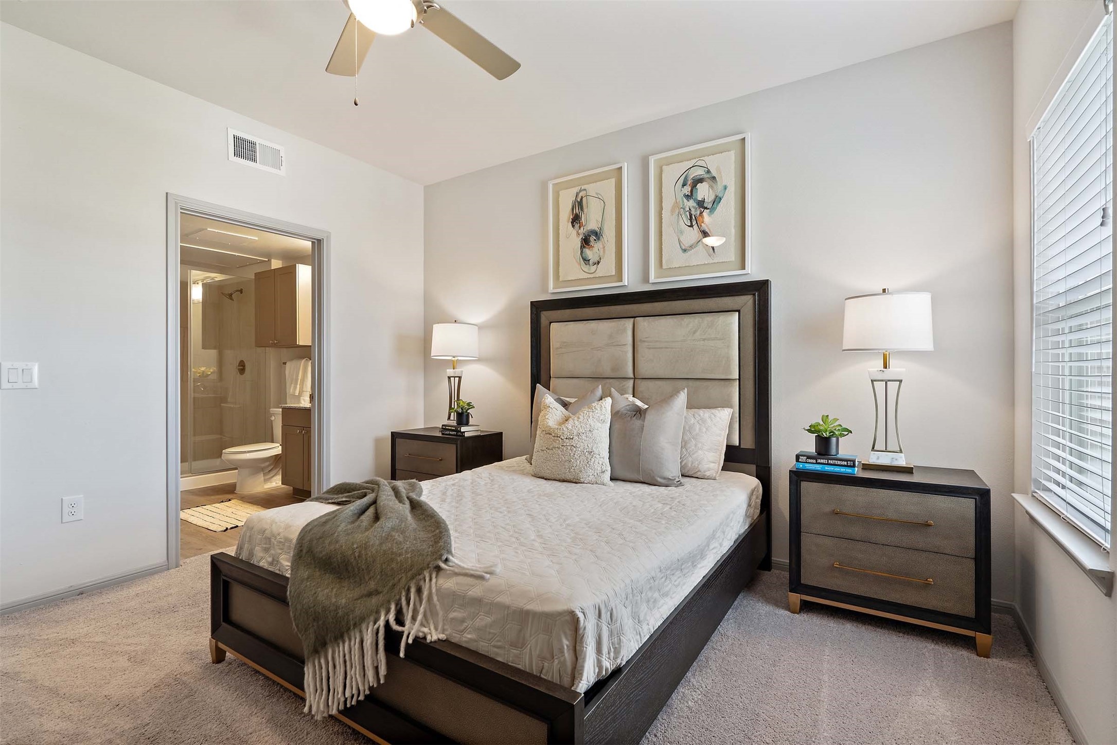 1101 Halsey Drive, Unit 818 Leander, TX 78641 - Photo 41 of 50 a bedroom with a bed lamp and a window