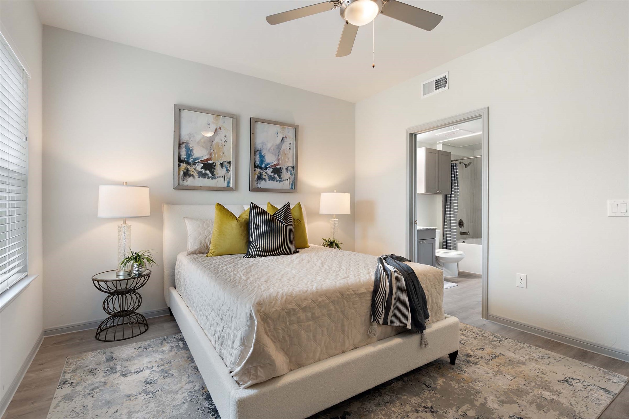 1101 Halsey Drive, Unit 818 Leander, TX 78641 - Photo 42 of 50 a bedroom with a bed and a chandelier