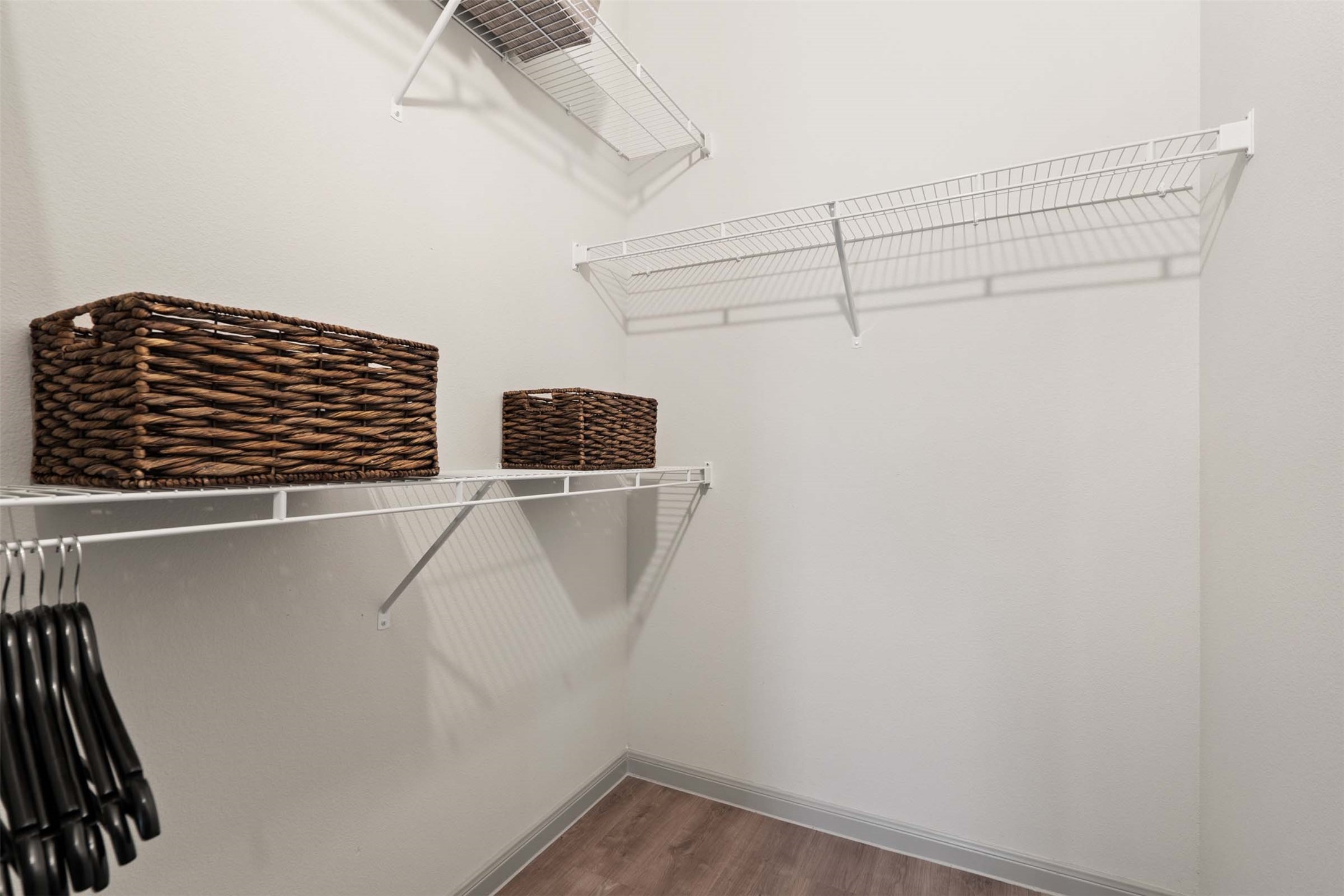 1101 Halsey Drive, Unit 818 Leander, TX 78641 - Photo 48 of 50 a view of a room with racks on the wall