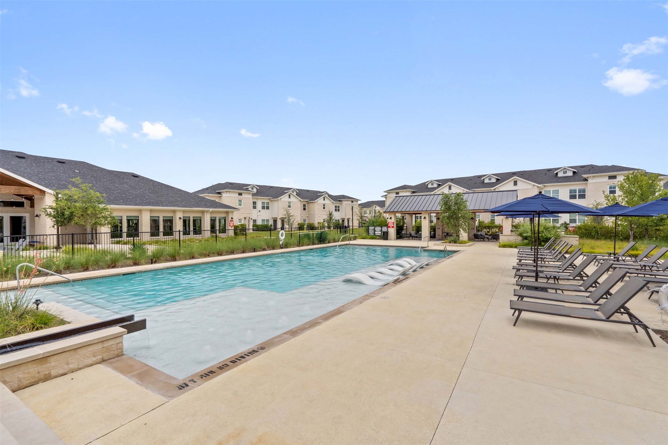 1101 Halsey Drive, Unit 818 Leander, TX 78641 - Photo 2 of 50 a view of an house with backyard and a garden