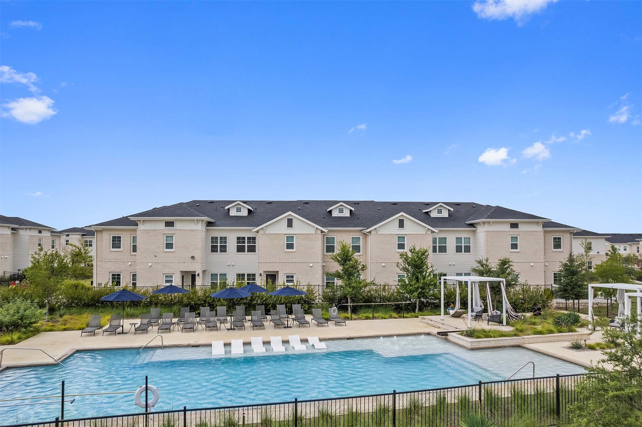 1101 Halsey Drive, Unit 818 Leander, TX 78641 - Photo 3 of 50 a view of a large building with a view of a building