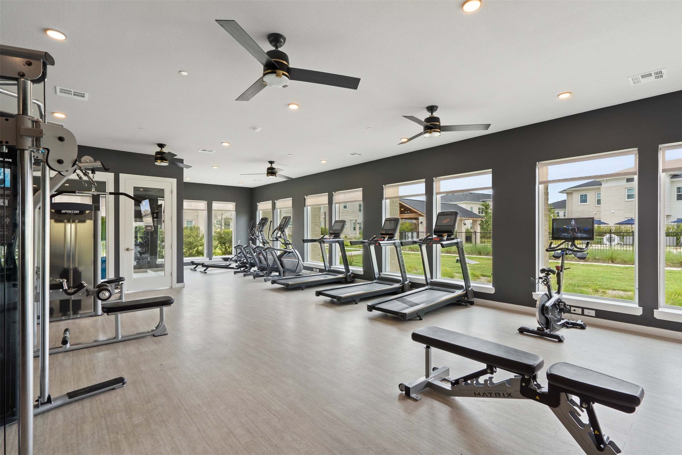 1101 Halsey Drive, Unit 818 Leander, TX 78641 - Photo 4 of 50 a view of a livingroom with workspace and large windows