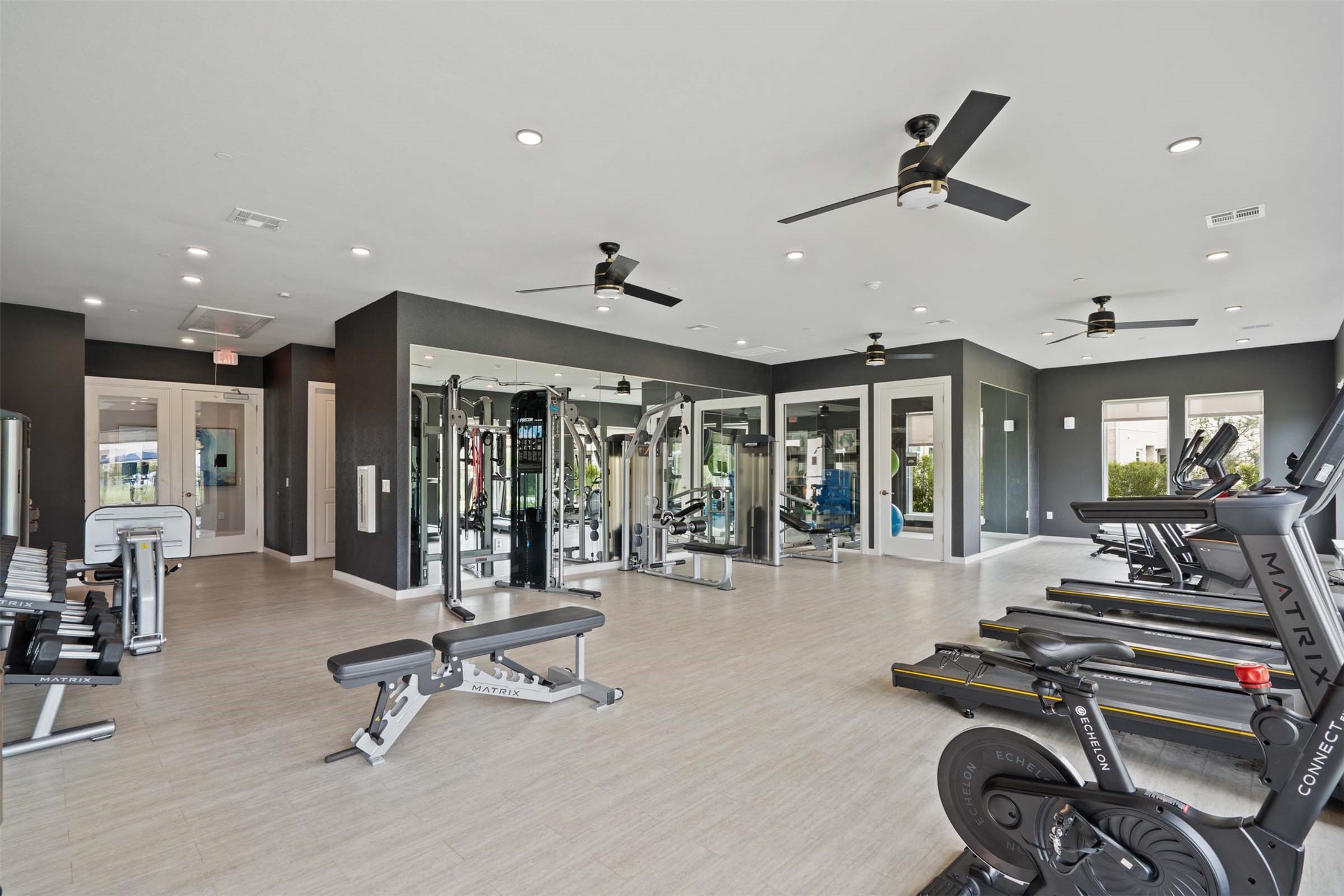 1101 Halsey Drive, Unit 818 Leander, TX 78641 - Photo 5 of 50 a view of a room with gym equipment