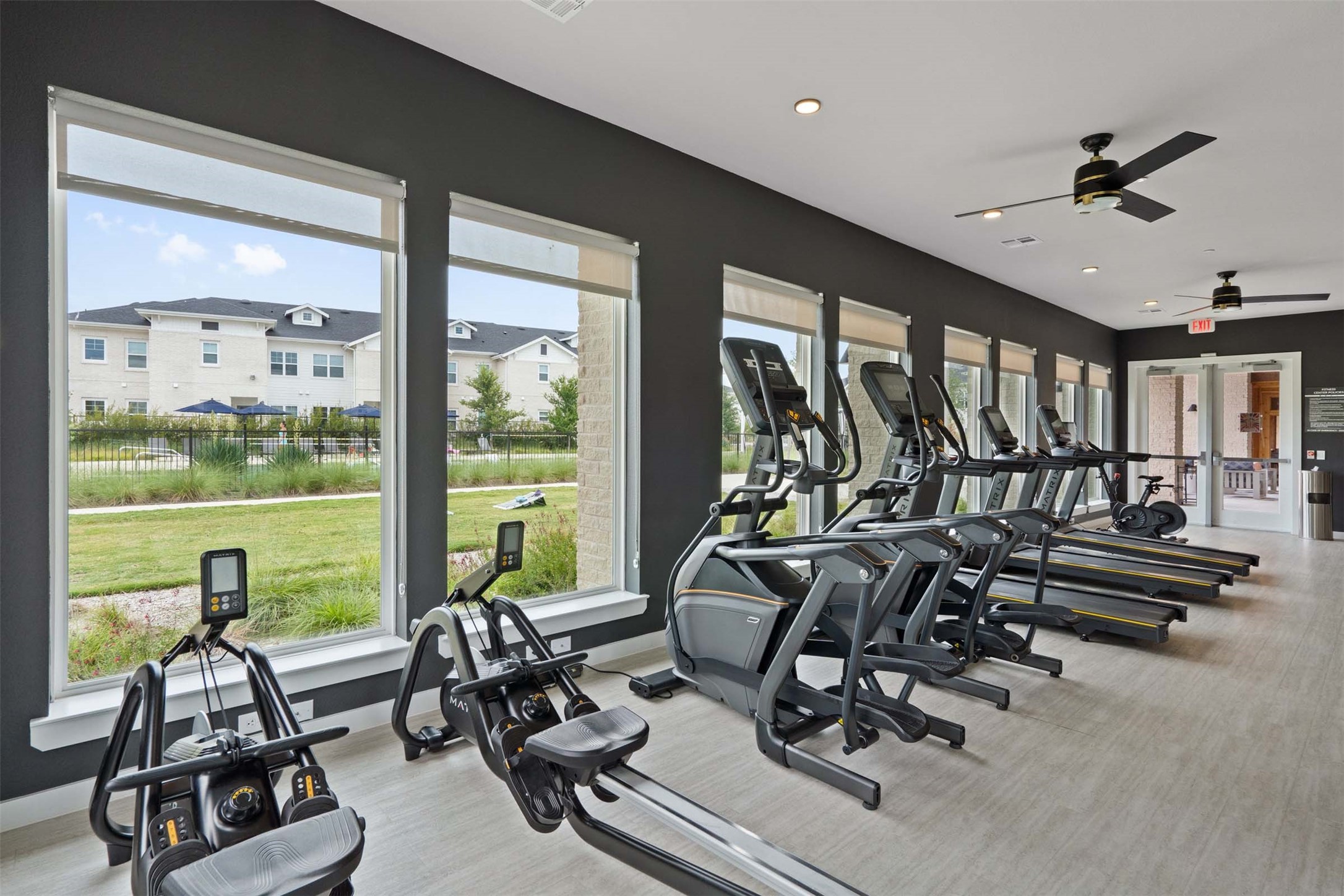 1101 Halsey Drive, Unit 818 Leander, TX 78641 - Photo 6 of 50 a view of a room with gym equipment