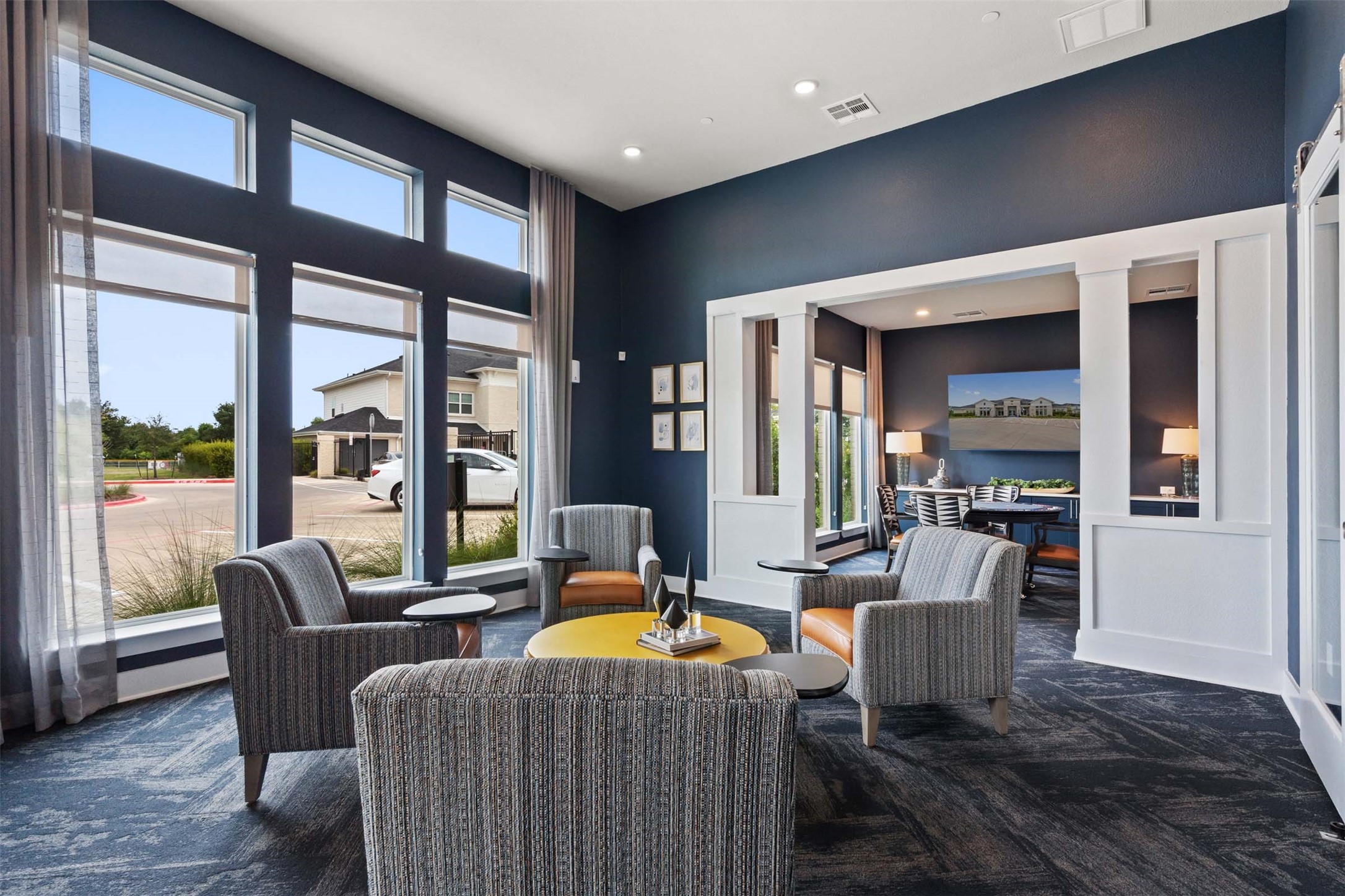 1101 Halsey Drive, Unit 818 Leander, TX 78641 - Photo 12 of 50 a living room with furniture two large window and wooden floor