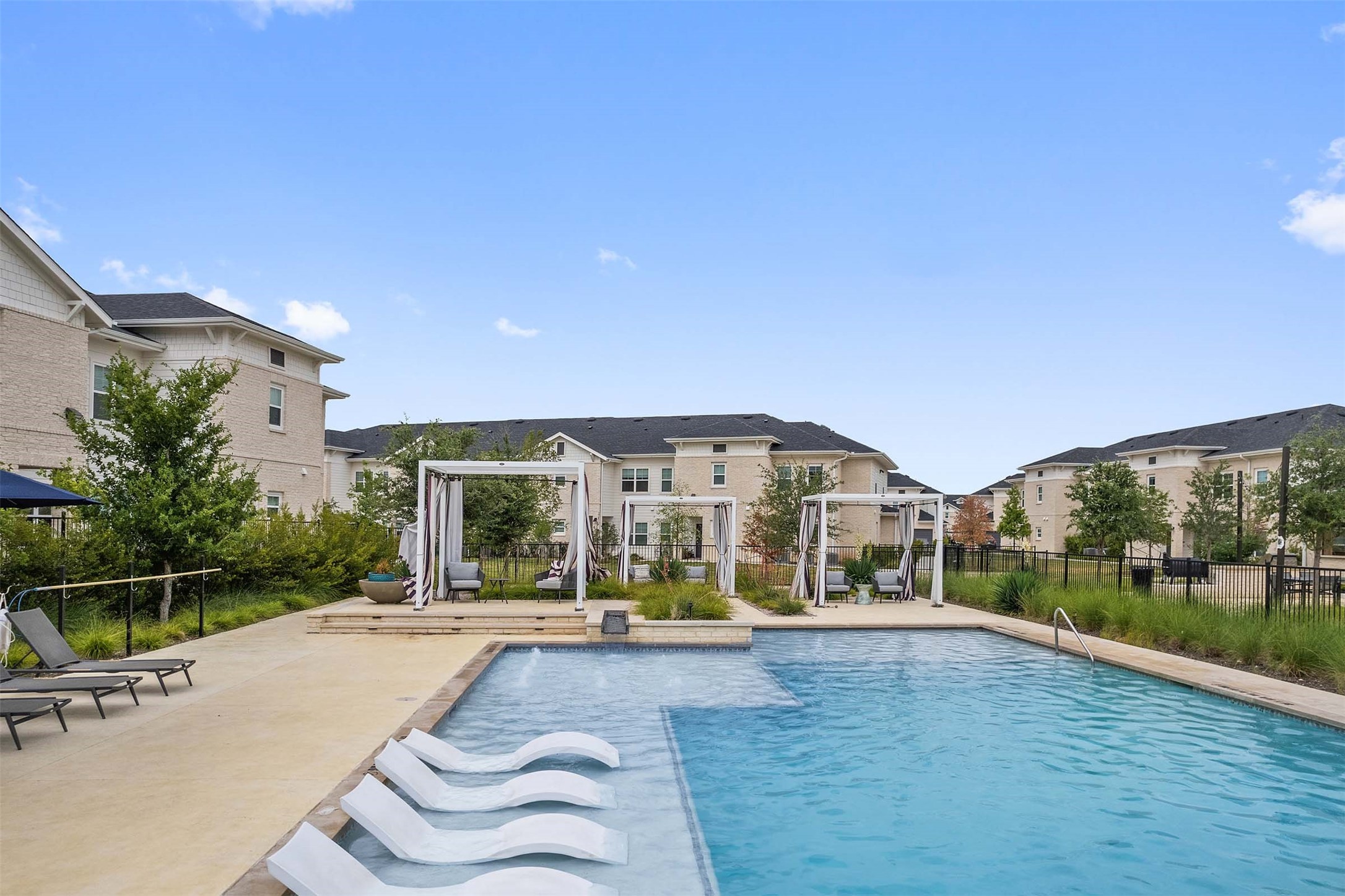 1101 Halsey Drive, Unit 818 Leander, TX 78641 - Photo 26 of 50 a view of house with a yard and potted plants