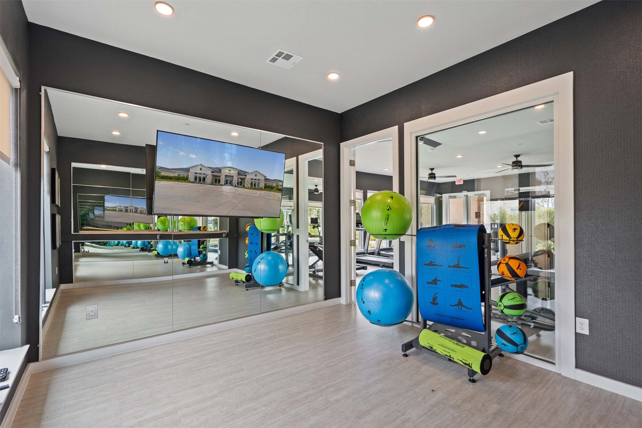 1101 Halsey Drive, Unit 818 Leander, TX 78641 - Photo 29 of 50 a view of a room with gym equipment