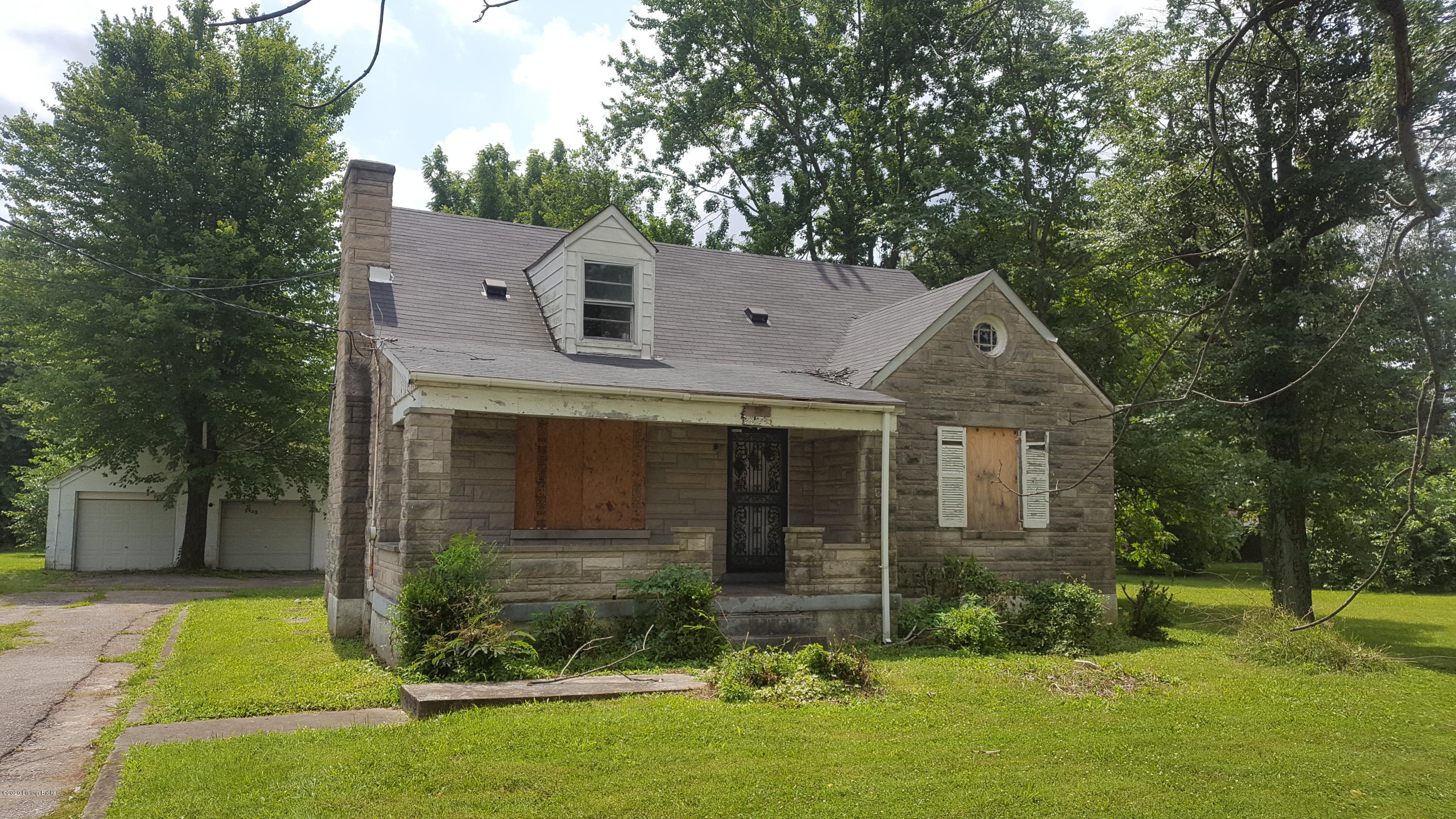 4707 Cane Run Road Louisville, KY 40216 - Photo 1 of 6 Front of home