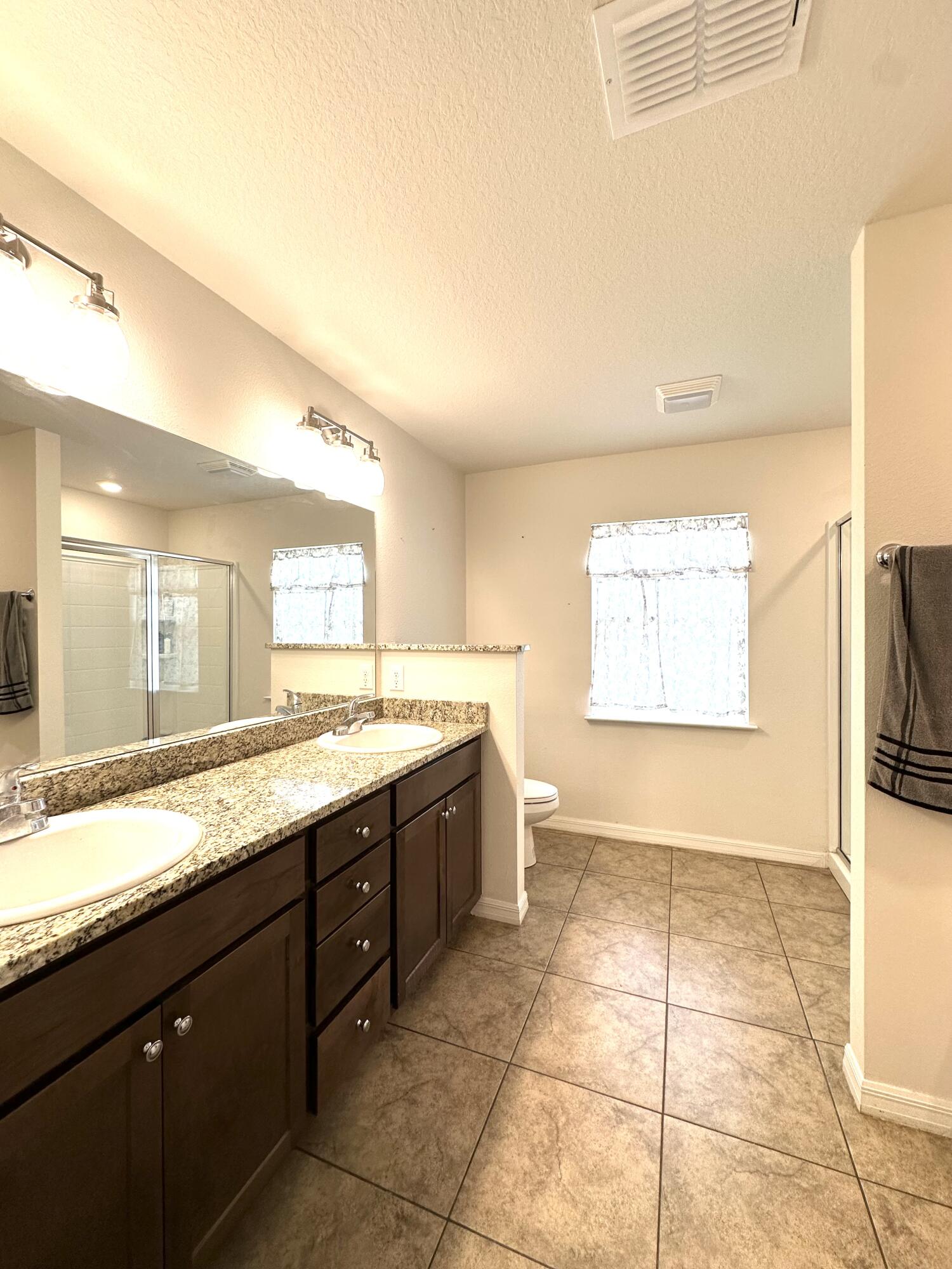 15211 Southwest 65th Ter Road Ocala, FL 34473 - Photo 13 of 22 Ensuite Master Bathroom - Double Sinks