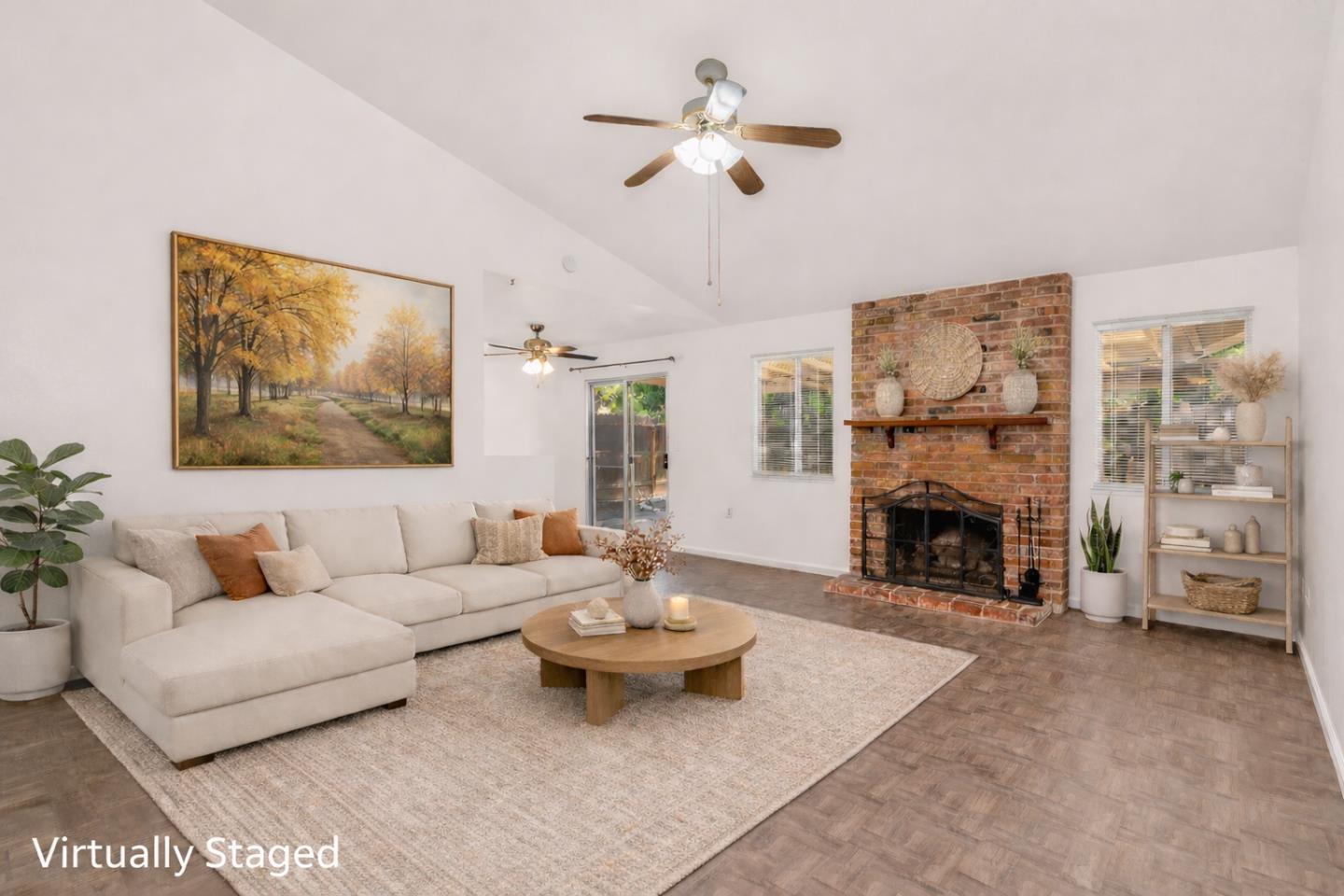 1351 Chukar Street Los Banos, CA 93635 - Photo 12 of 34 a living room with furniture and a fireplace
