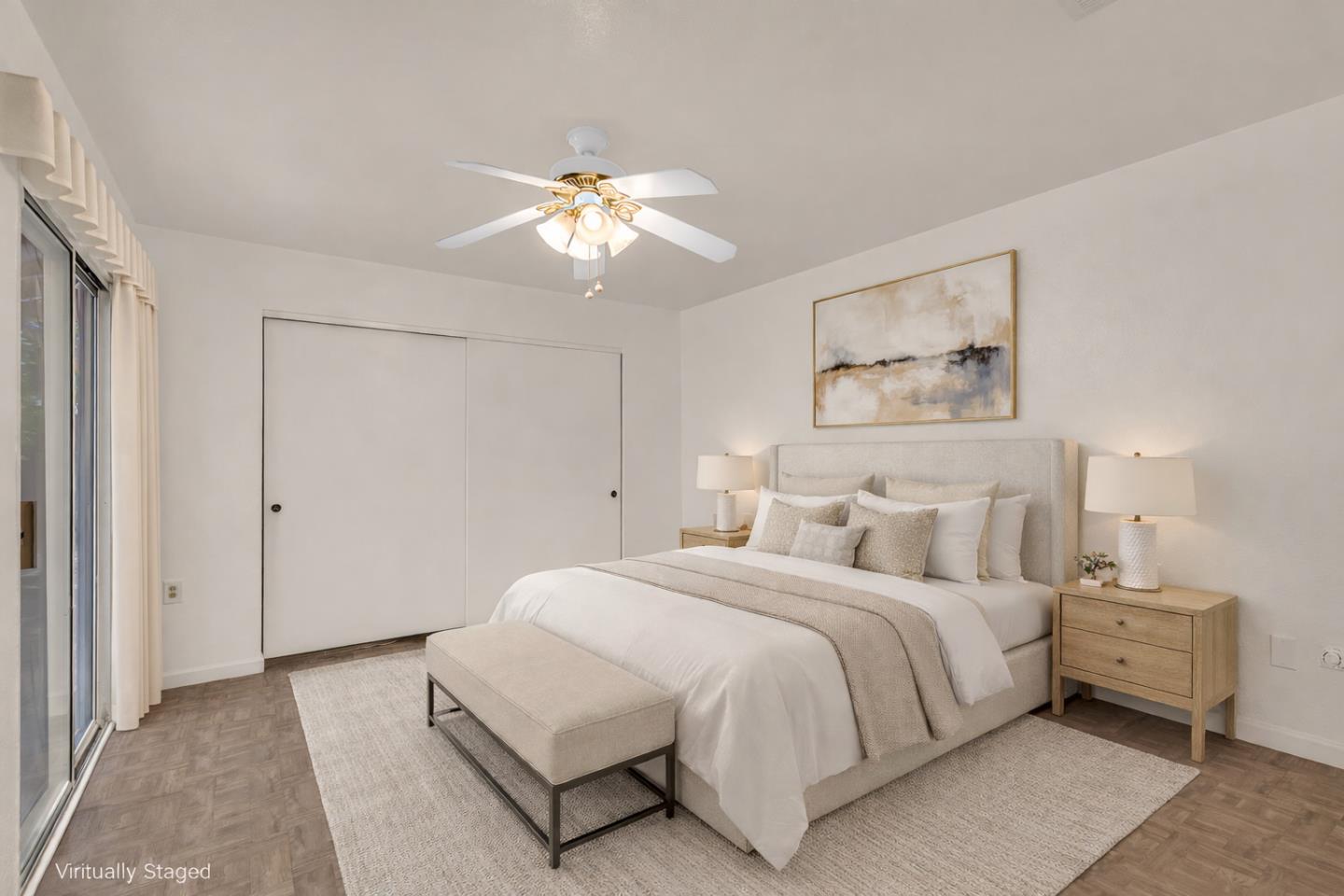 1351 Chukar Street Los Banos, CA 93635 - Photo 20 of 34 a bedroom with a bed and a chandelier