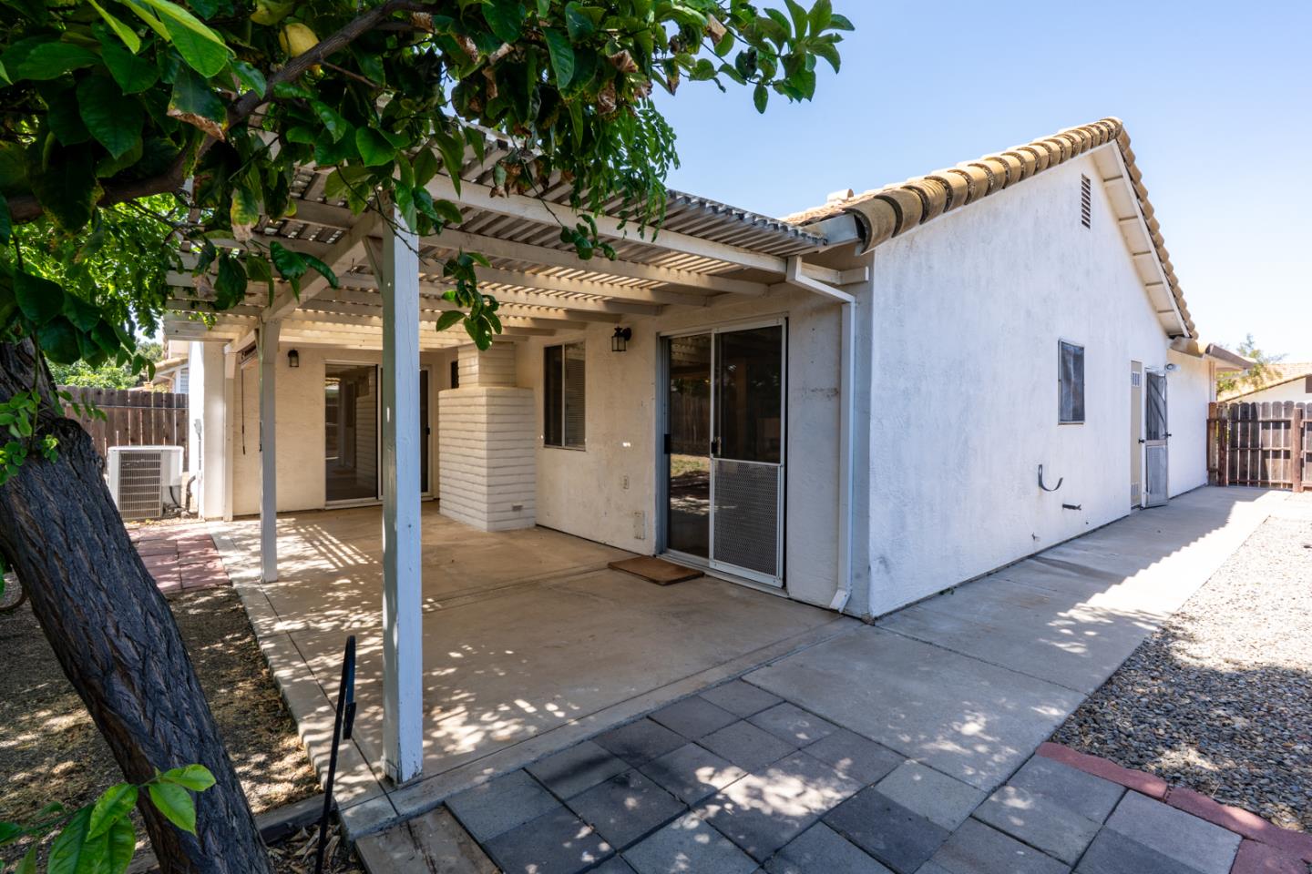 1351 Chukar Street Los Banos, CA 93635 - Photo 25 of 34 a view of a house with backyard from a porch