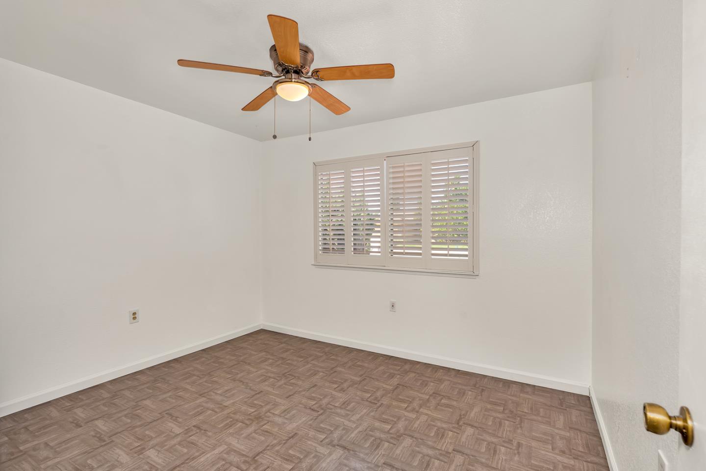 1351 Chukar Street Los Banos, CA 93635 - Photo 7 of 34 a view of an empty room with a window