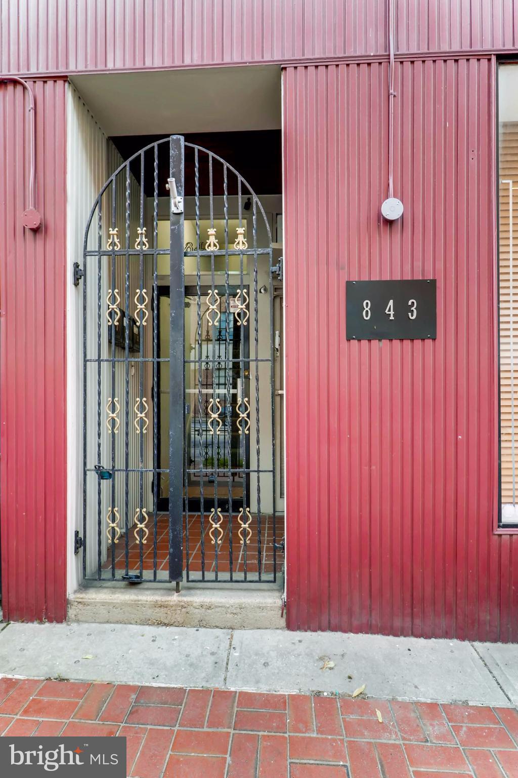 a front view of a house with a glass door