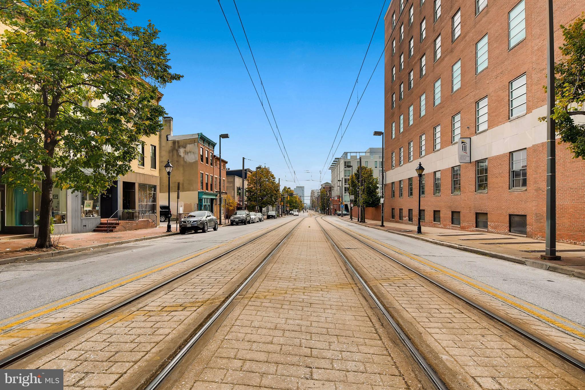 843 North Howard Street, Unit 2 Baltimore, MD 21201 - Photo 13 of 16 a view of a street with a building on the street