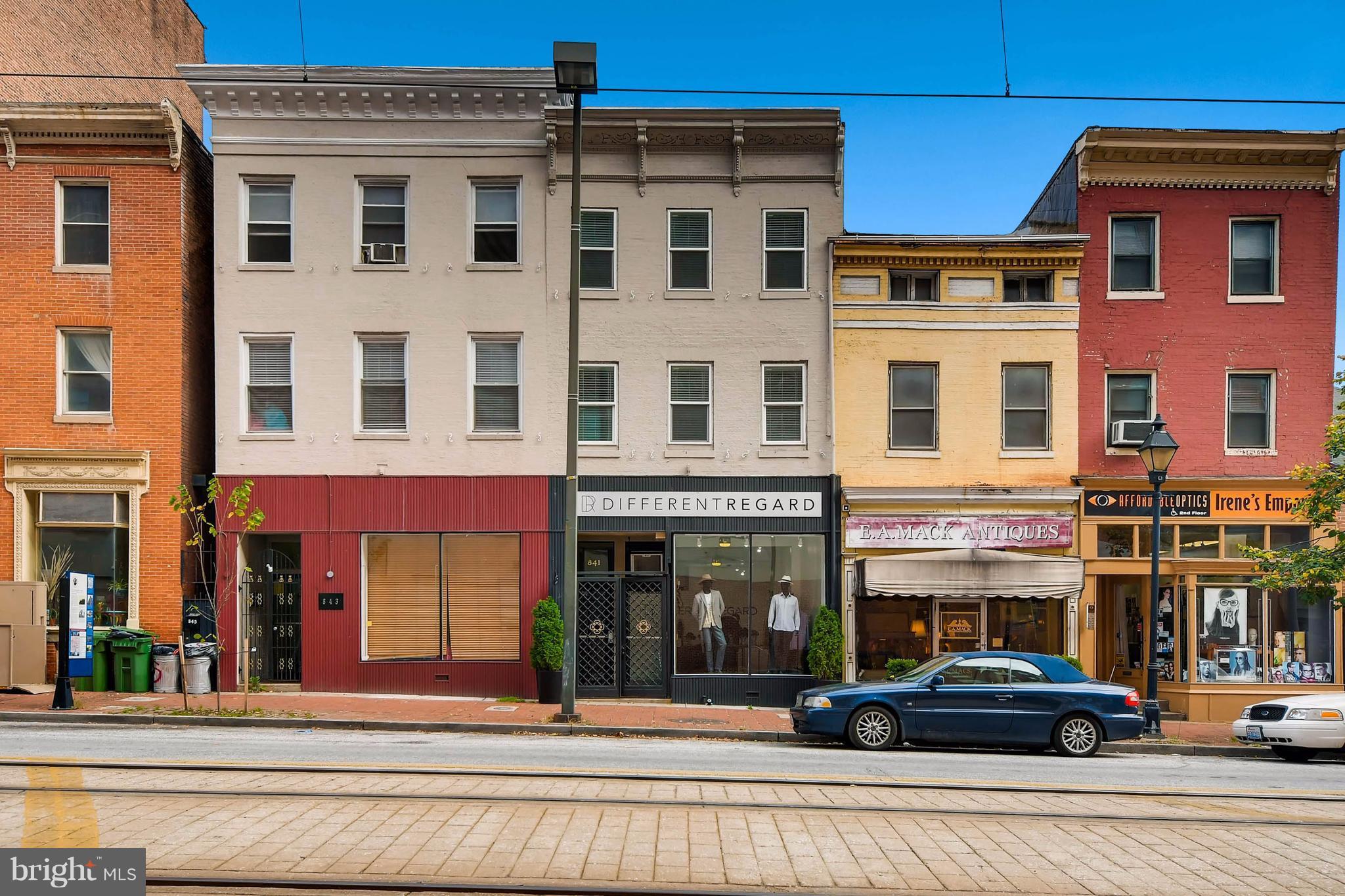 843 North Howard Street, Unit 2 Baltimore, MD 21201 - Photo 14 of 16 a view of a building with car parked