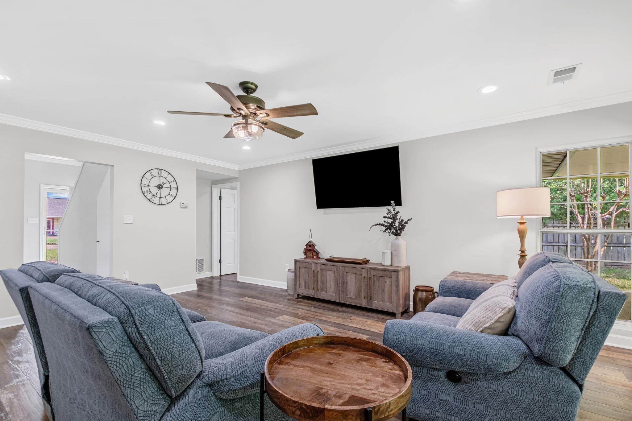4729 Cedar Ridge Drive Millington, TN 38053 - Photo 5 of 40 Spacious living area featuring wood-finish flooring, recessed lighting, and a ceiling fan with light fixture
