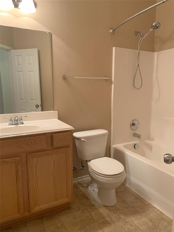 3313 Timber Ridge Trail McKinney, TX 75071 - Photo 7 of 20 Full bathroom featuring toilet, vanity, and washtub / shower combination