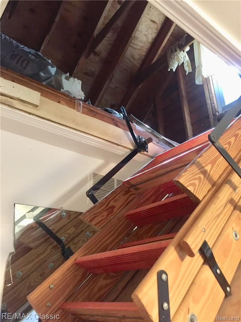 28795 Northline Road Romulus, MI 48174 - Photo 15 of 28 Pull down ladder to attic storage area in Master Bedroom