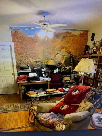 a view of a swimming pool with outdoor seating