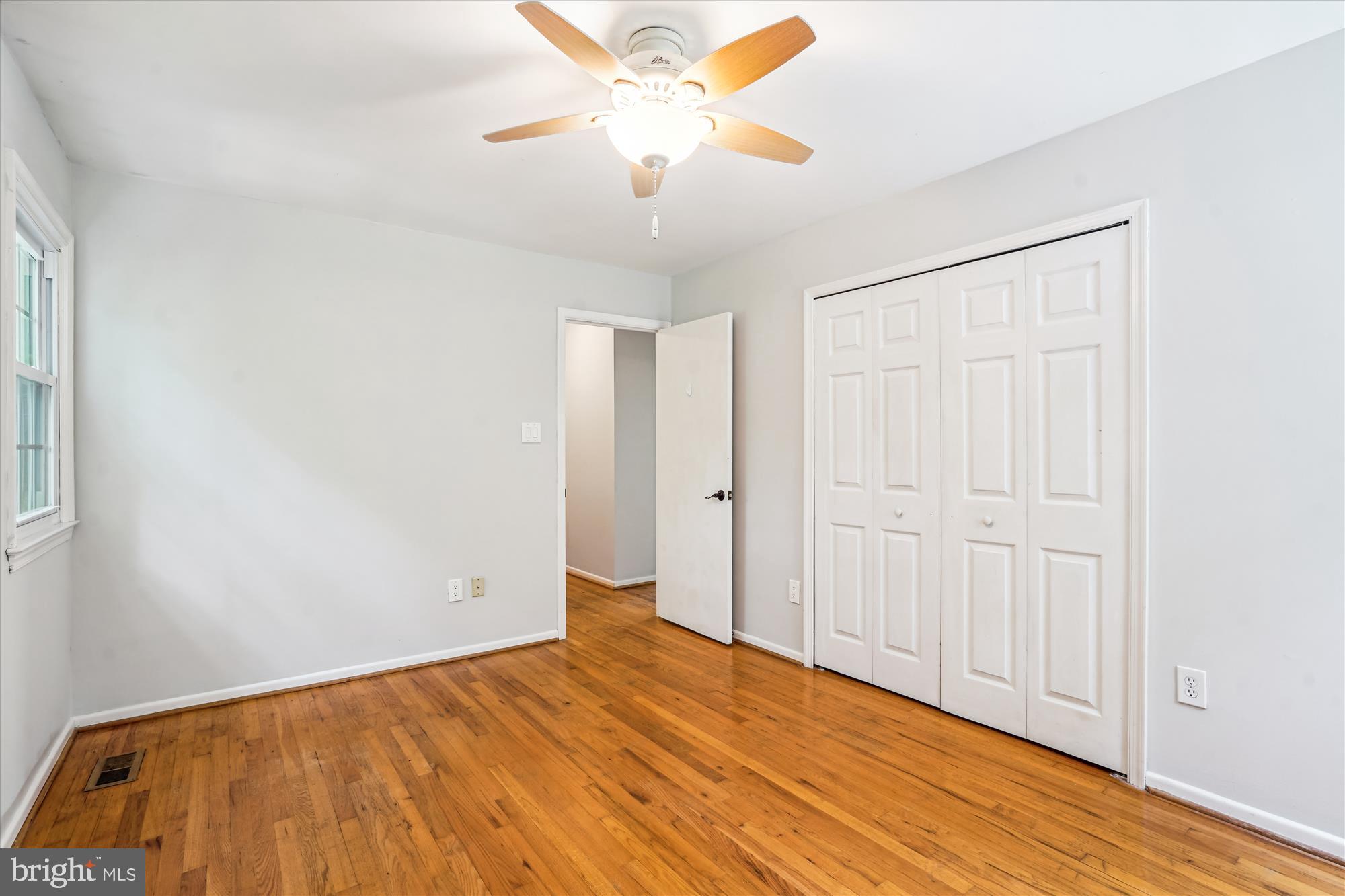 8322 Cushing Court Springfield, VA 22153 - Photo 21 of 57 a view of empty room with wooden floor