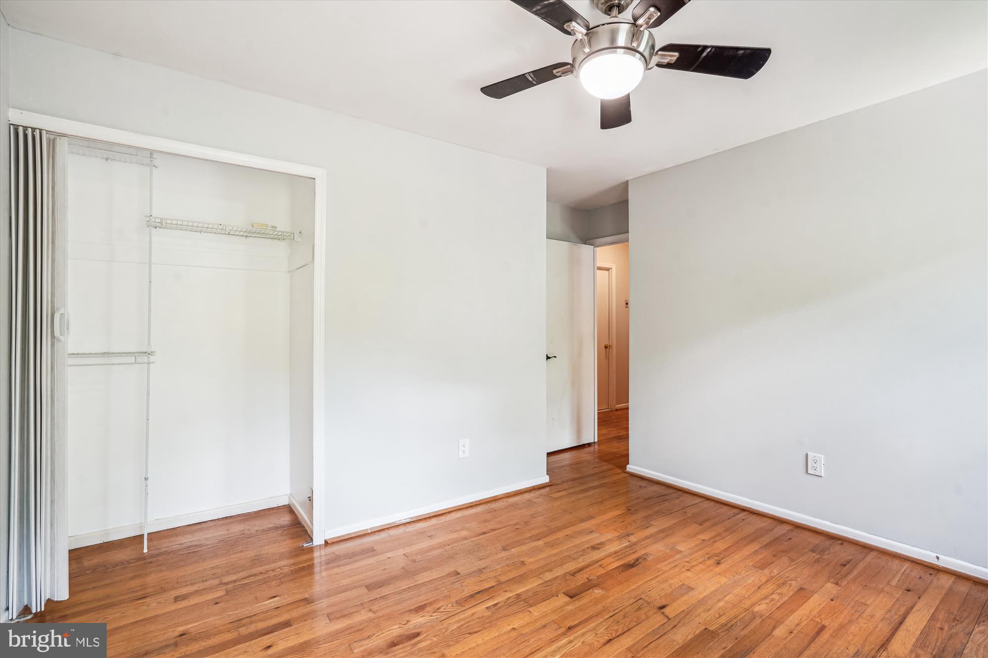 8322 Cushing Court Springfield, VA 22153 - Photo 23 of 57 a view of empty room with wooden floor