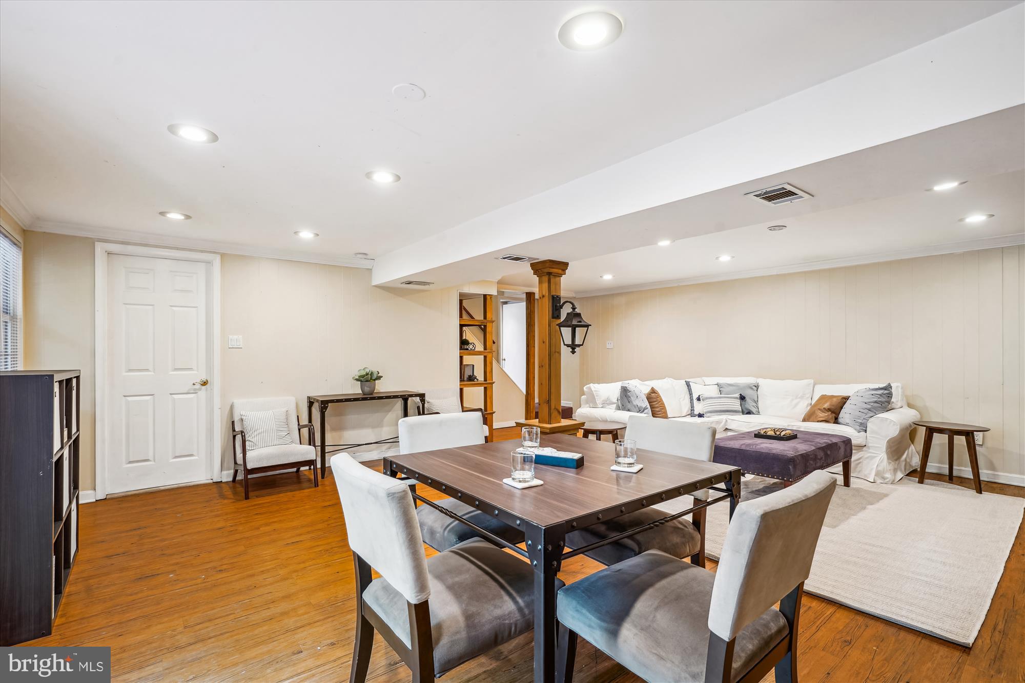 8322 Cushing Court Springfield, VA 22153 - Photo 28 of 57 a view of a dining room with furniture and wooden floor