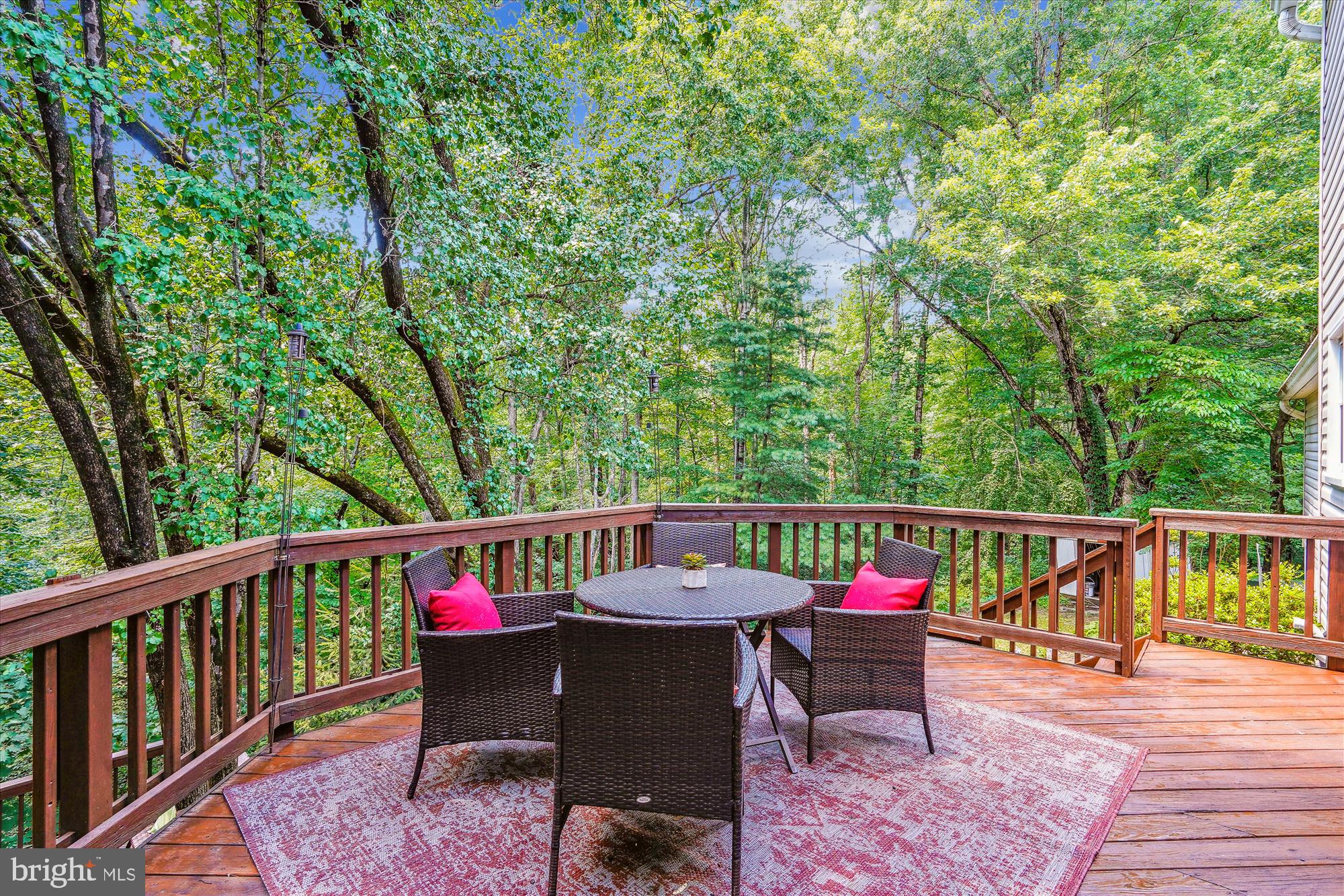8322 Cushing Court Springfield, VA 22153 - Photo 33 of 57 a view of a chairs and table on the wooden deck