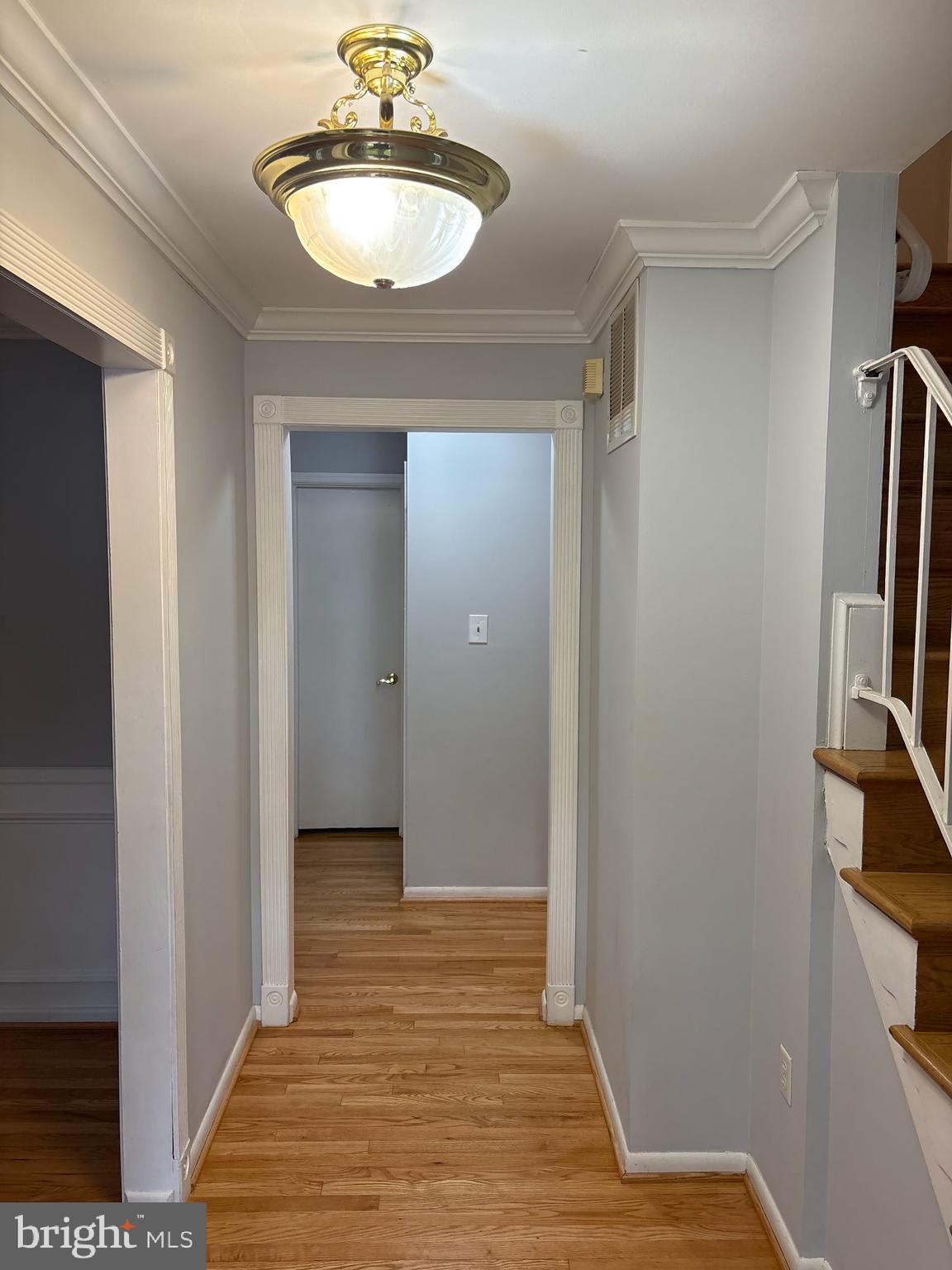 8322 Cushing Court Springfield, VA 22153 - Photo 4 of 57 a view of a livingroom from a hallway