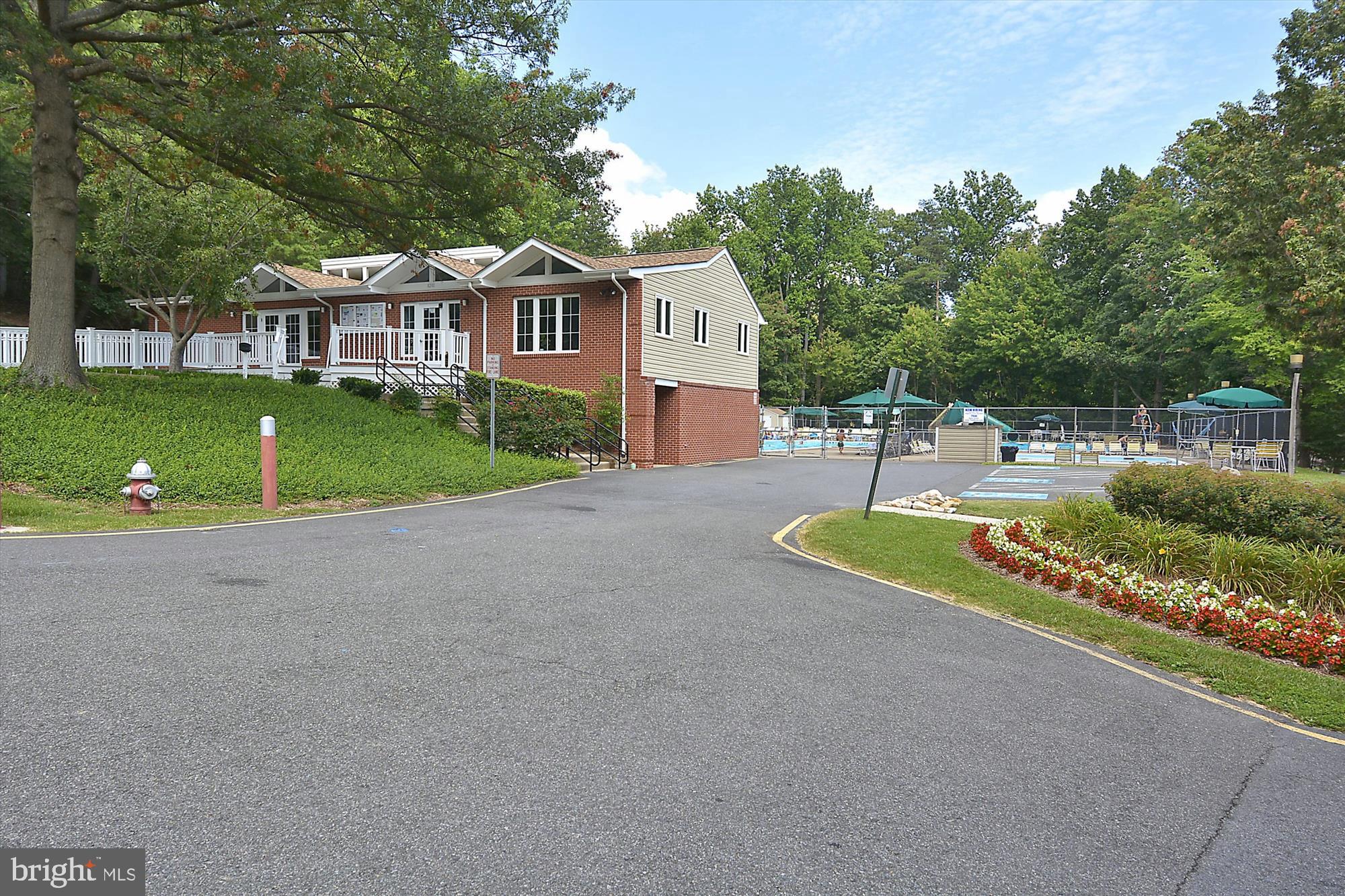 8322 Cushing Court Springfield, VA 22153 - Photo 43 of 57 a view of a house with a yard and tree s