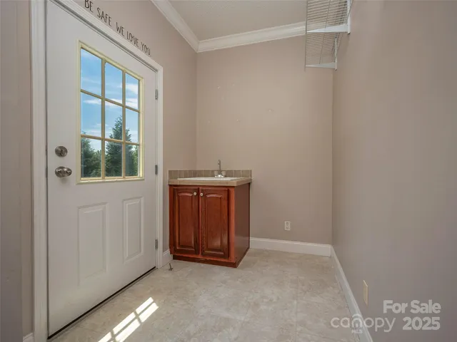 a view of an empty room and window