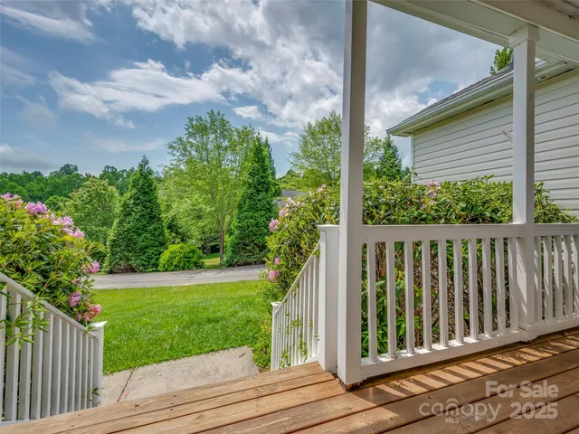 a view of a porch with a yard