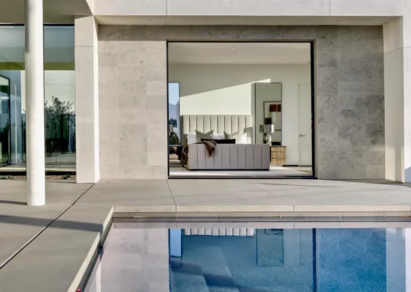 a bathroom with a sink and a large mirror