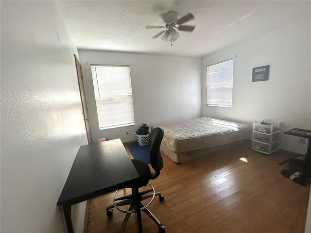 a bathroom with a double vanity sink a mirror and a shower