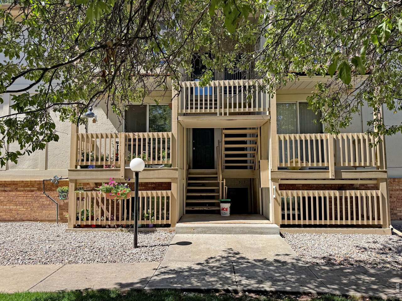 1024 East Swallow Road, Unit 311 Fort Collins, CO 80525 - Photo 1 of 16 Garden Level Entry