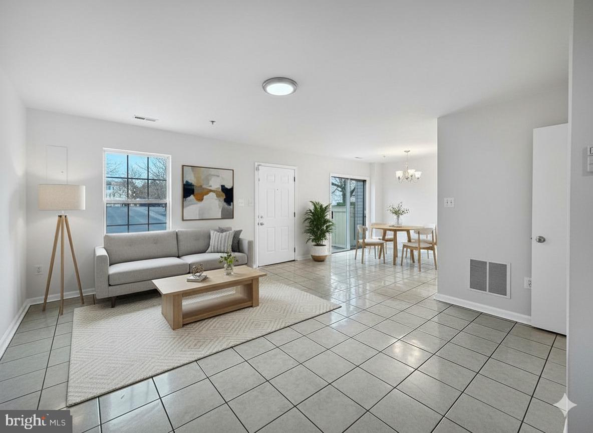 102 Crossbill Way Frederick, MD 21702 - Photo 5 of 16 a living room with furniture and a table