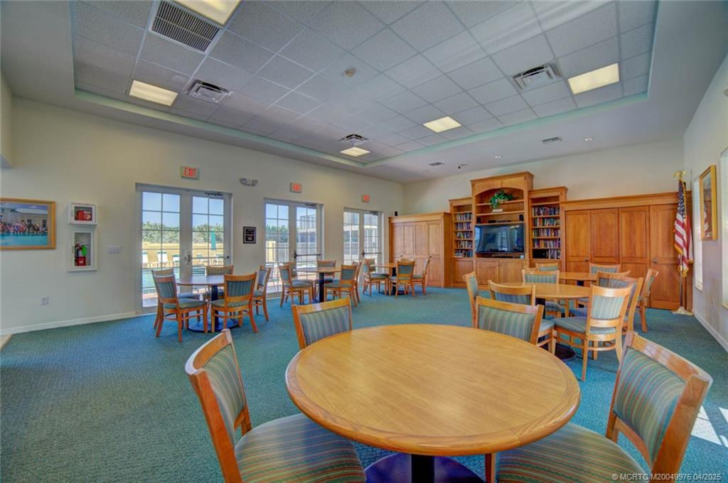 7380 South Ocean Drive, Unit 220 Jensen Beach, FL 34957 - Photo 23 of 33 a view of a dining room with furniture