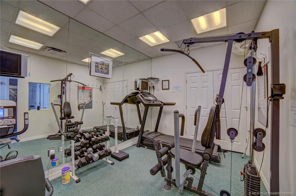 7380 South Ocean Drive, Unit 220 Jensen Beach, FL 34957 - Photo 26 of 33 a view of a room with gym equipment