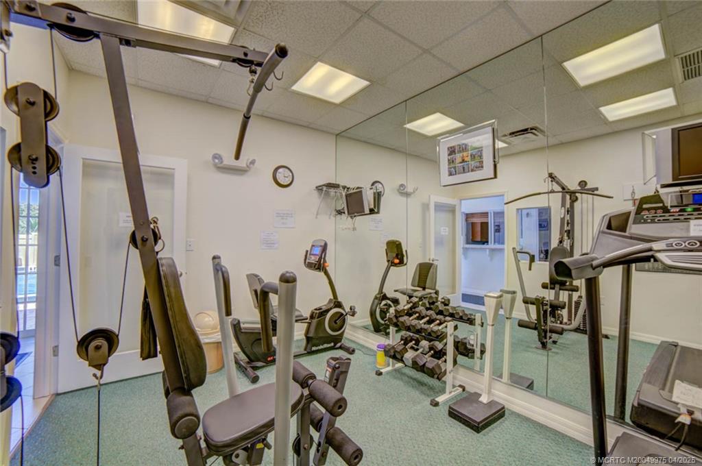7380 South Ocean Drive, Unit 220 Jensen Beach, FL 34957 - Photo 27 of 33 a view of a room with gym equipment