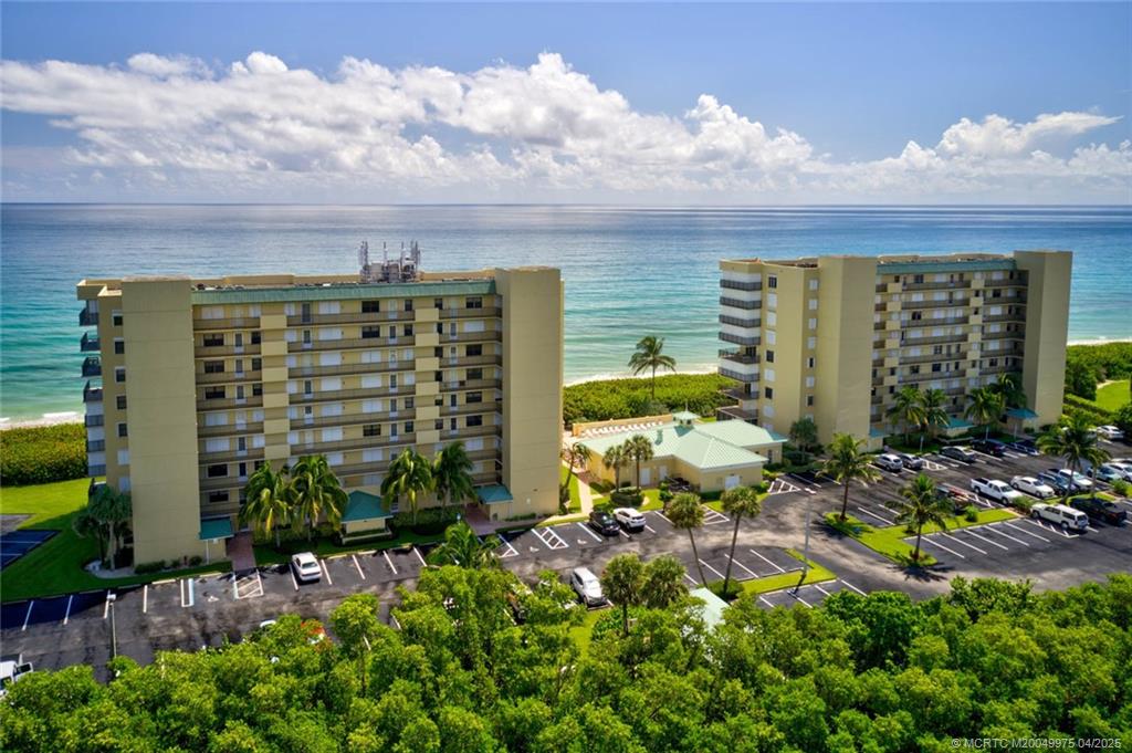 7380 South Ocean Drive, Unit 220 Jensen Beach, FL 34957 - Photo 30 of 33 a view of building with outdoor space