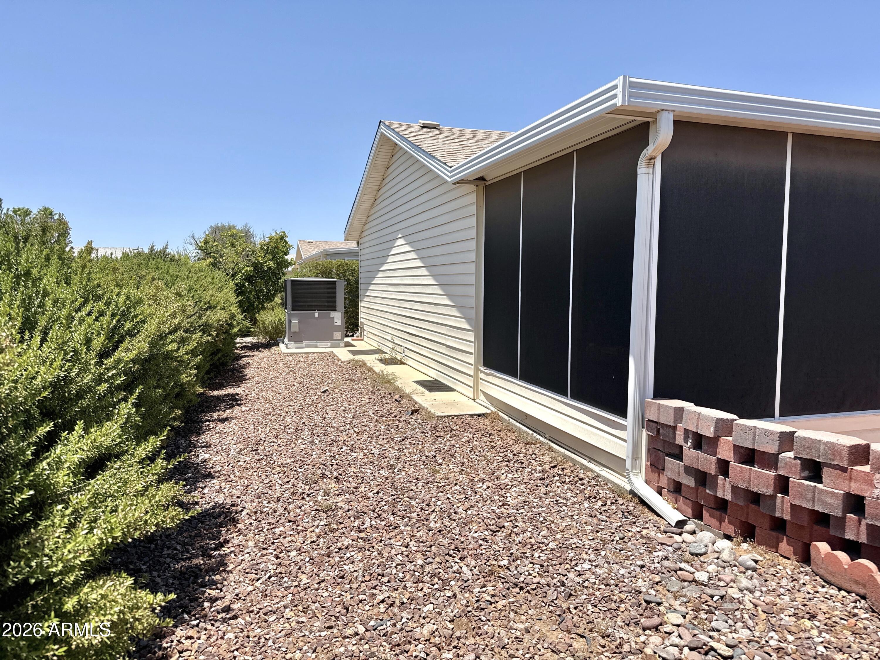 2550 South Ellsworth Road, Unit 208 Mesa, AZ 85209 - Photo 30 of 44 Private backyard with mature foliage