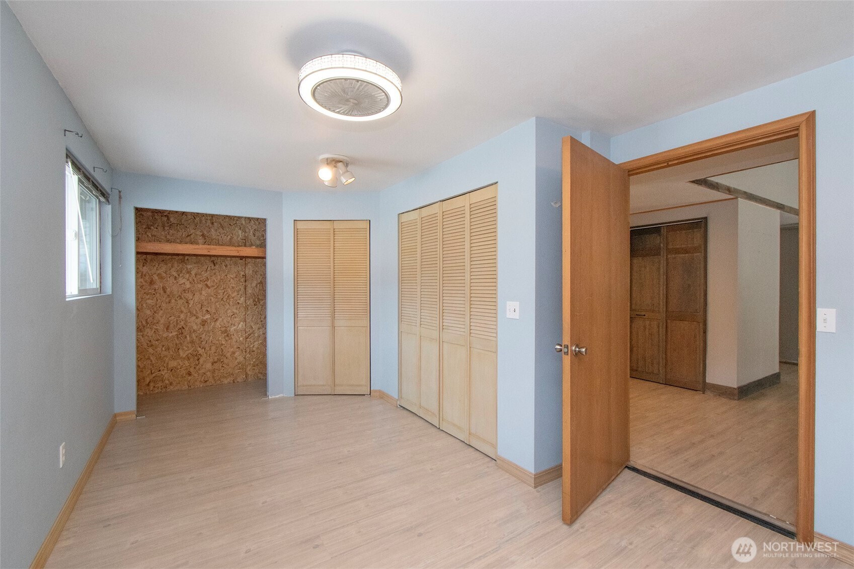 1515 Olson Road Sequim, WA 98382 - Photo 19 of 40 a view of an empty room with closet and a window