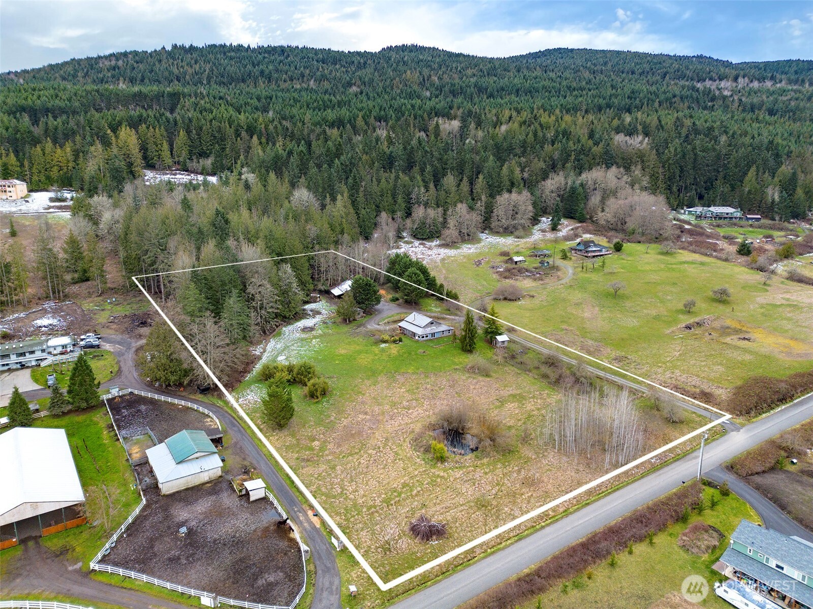 1515 Olson Road Sequim, WA 98382 - Photo 3 of 40 a view of a swimming pool with a yard