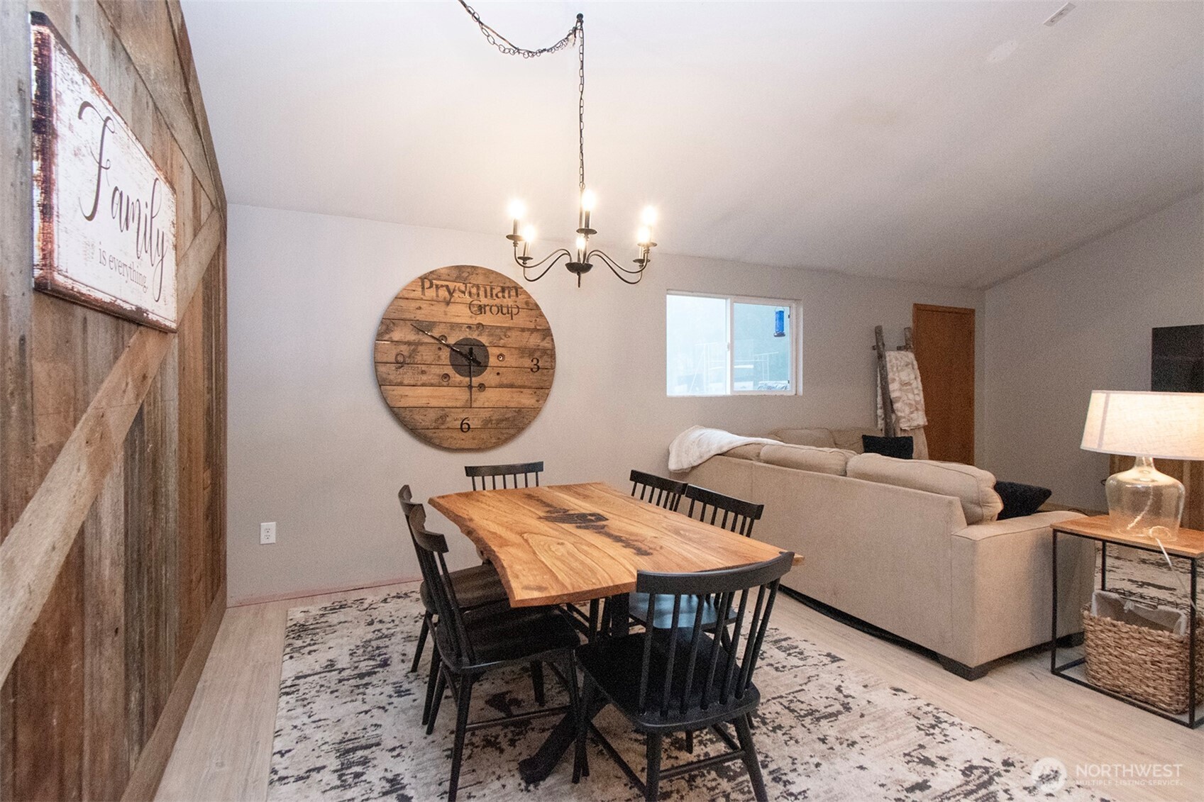 1515 Olson Road Sequim, WA 98382 - Photo 8 of 40 a view of a dining room with furniture and a chandelier