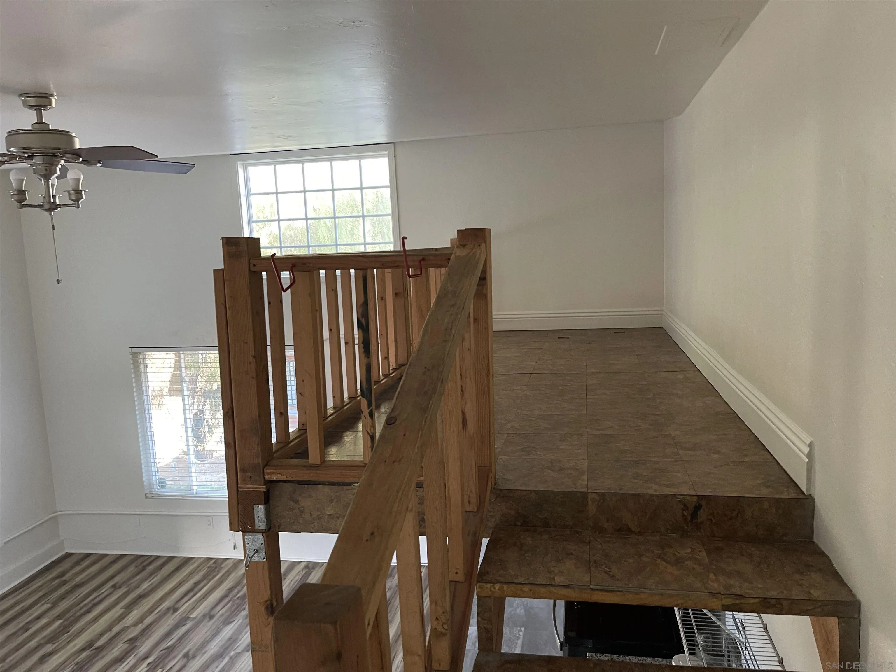 3246 Sweetwater Road Lemon Grove, CA 91945 - Photo 3 of 13 wooden floor in a hall with a window