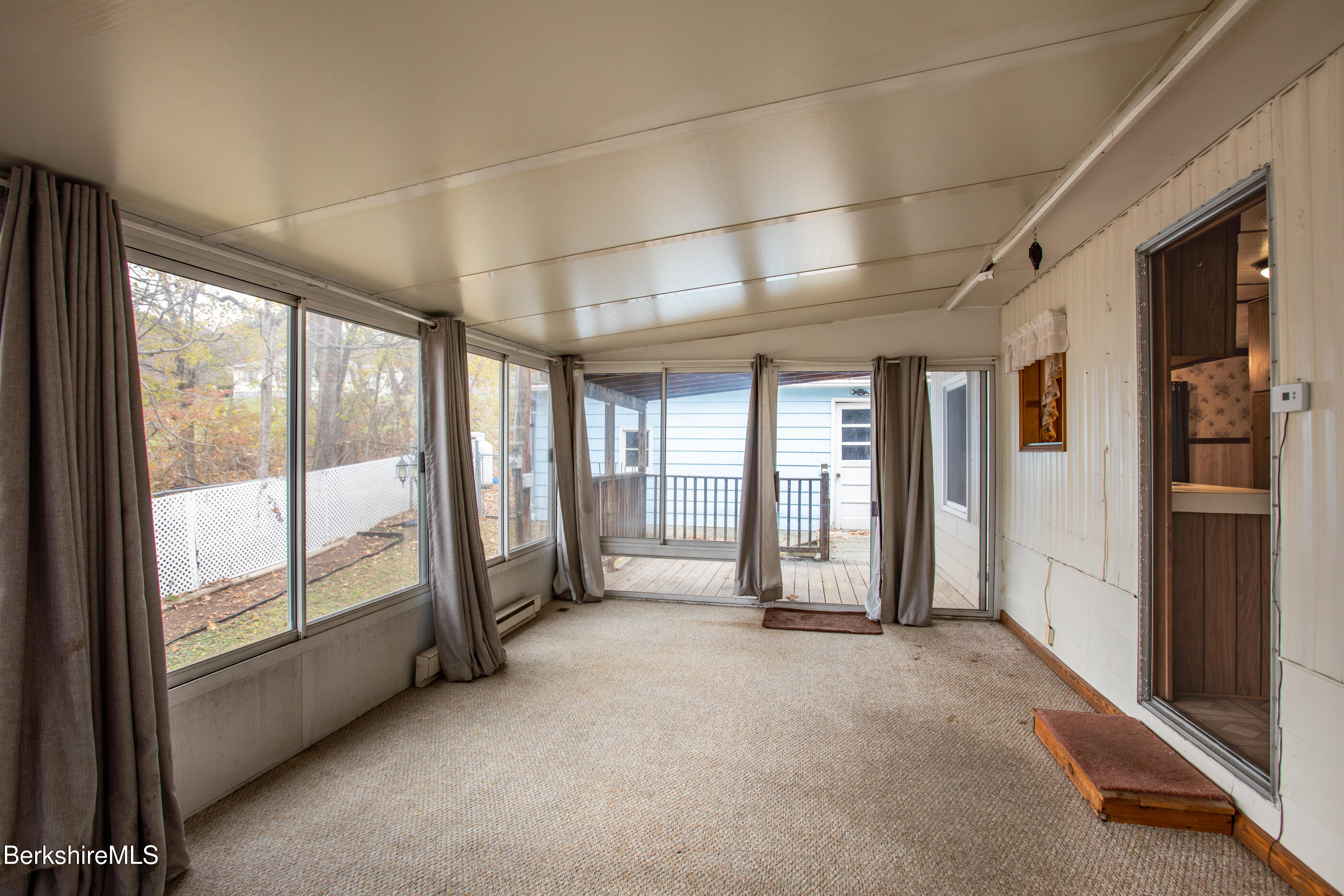 21 Overlook Terrace Adams, MA 01220 - Photo 12 of 31 a view of an empty room with a sliding door