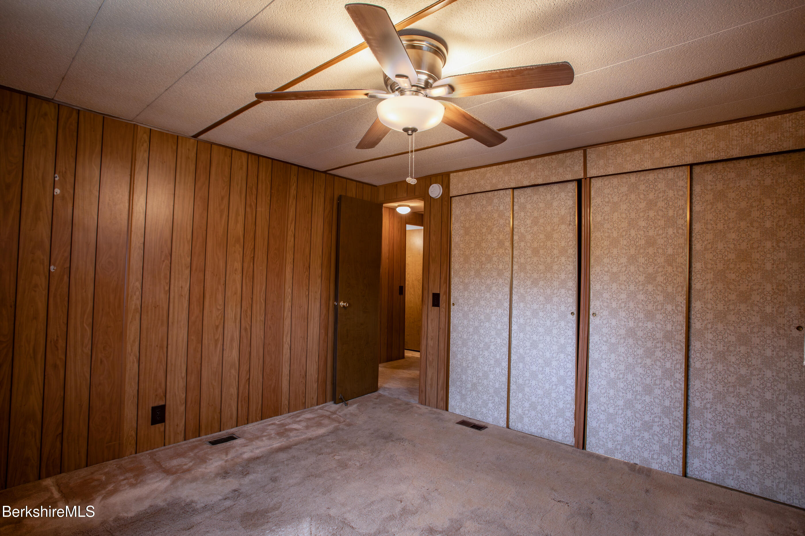 21 Overlook Terrace Adams, MA 01220 - Photo 18 of 31 a view of a hallway with a chandelier fan and windows