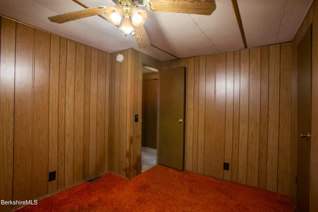 a view of hallway with natural light